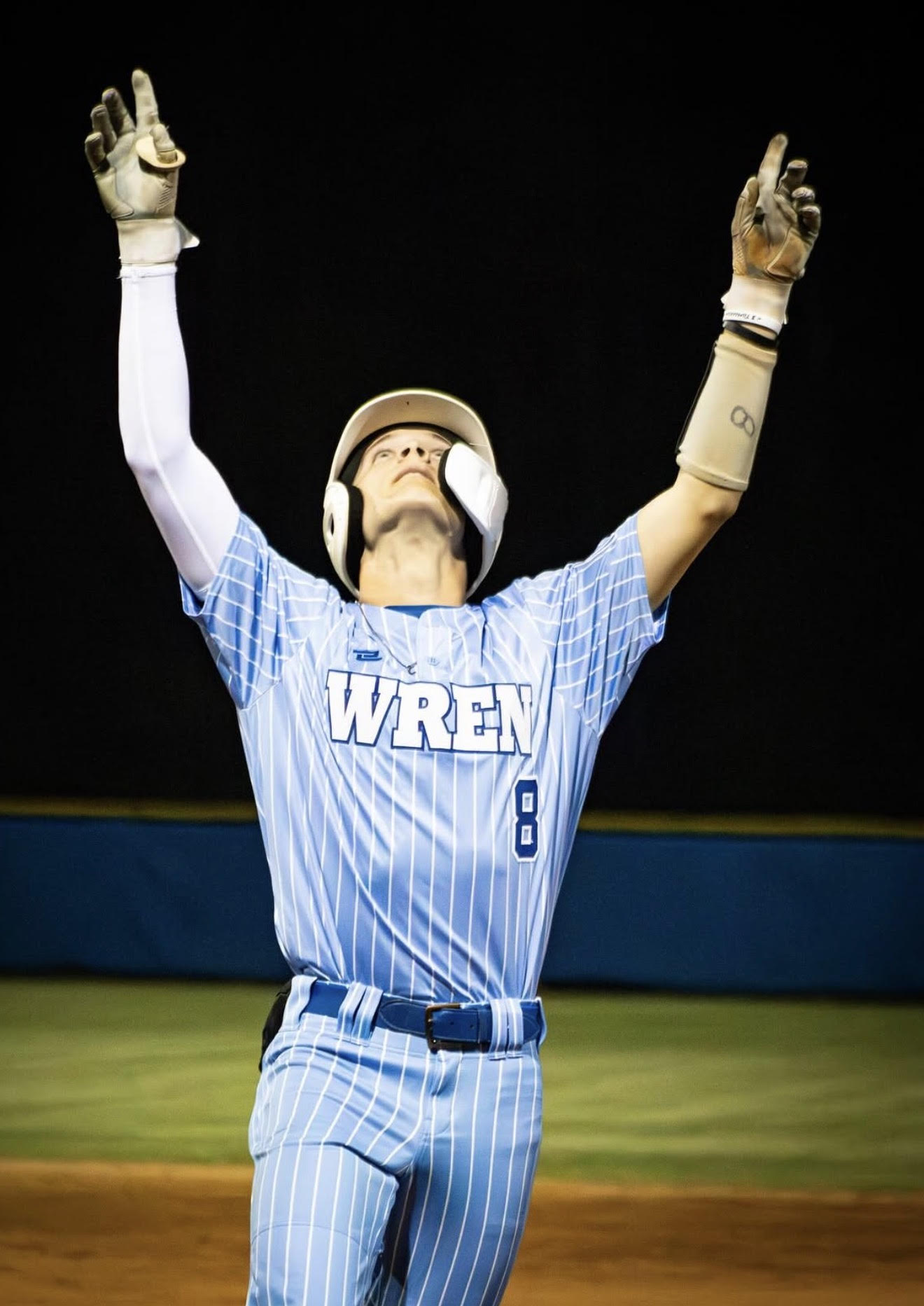A South Carolina high-school baseball team celebrating under the lights